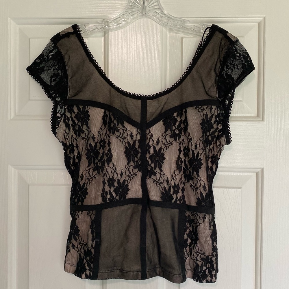 Black lace blouse with pale lining